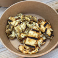 A bowl of griddled halloumi pieces with charred grill marks, seasoned with Forge & Fyre Lemon & Herb rub